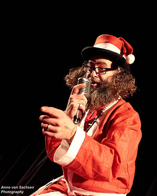 host  at the Santa & his girls edition of the International Burlsque Circus